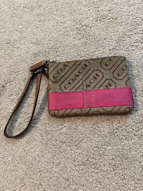 Coach Tan Signature Canvas Wristlet with Pink Accent Stripe